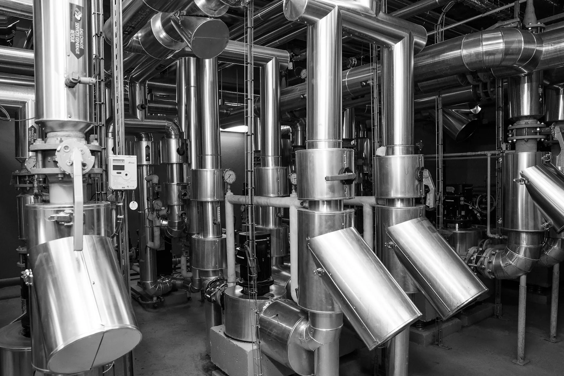 Production equipment and machinery inside a manufacturing plant