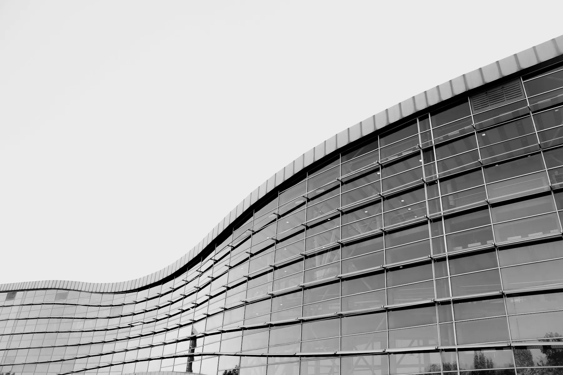 Curved glass facade of a commercial building