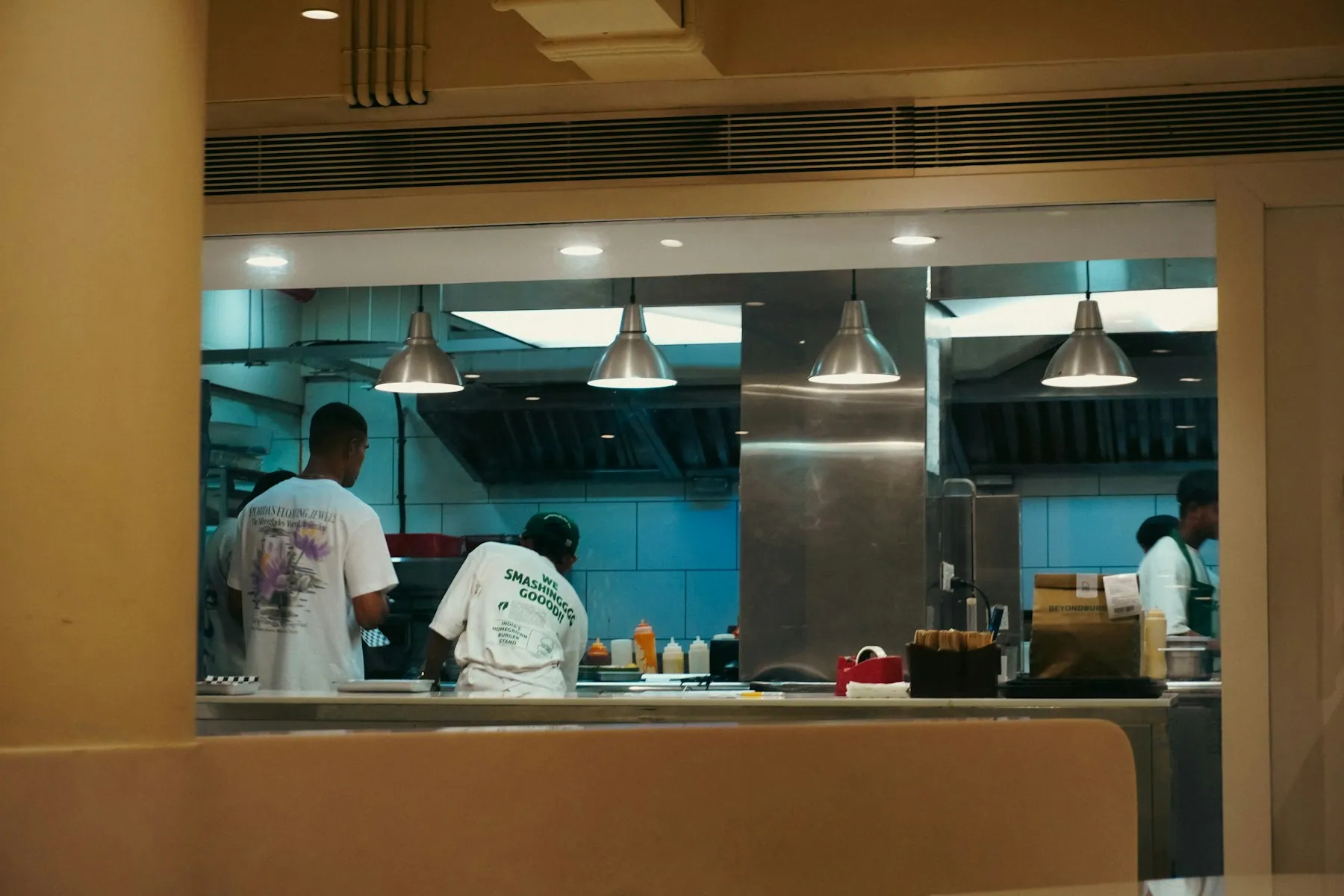Restaurant team working in a professional open kitchen