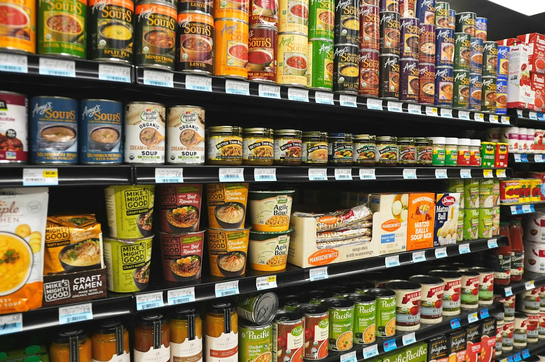 Interior of a grocery store with stocked product displays