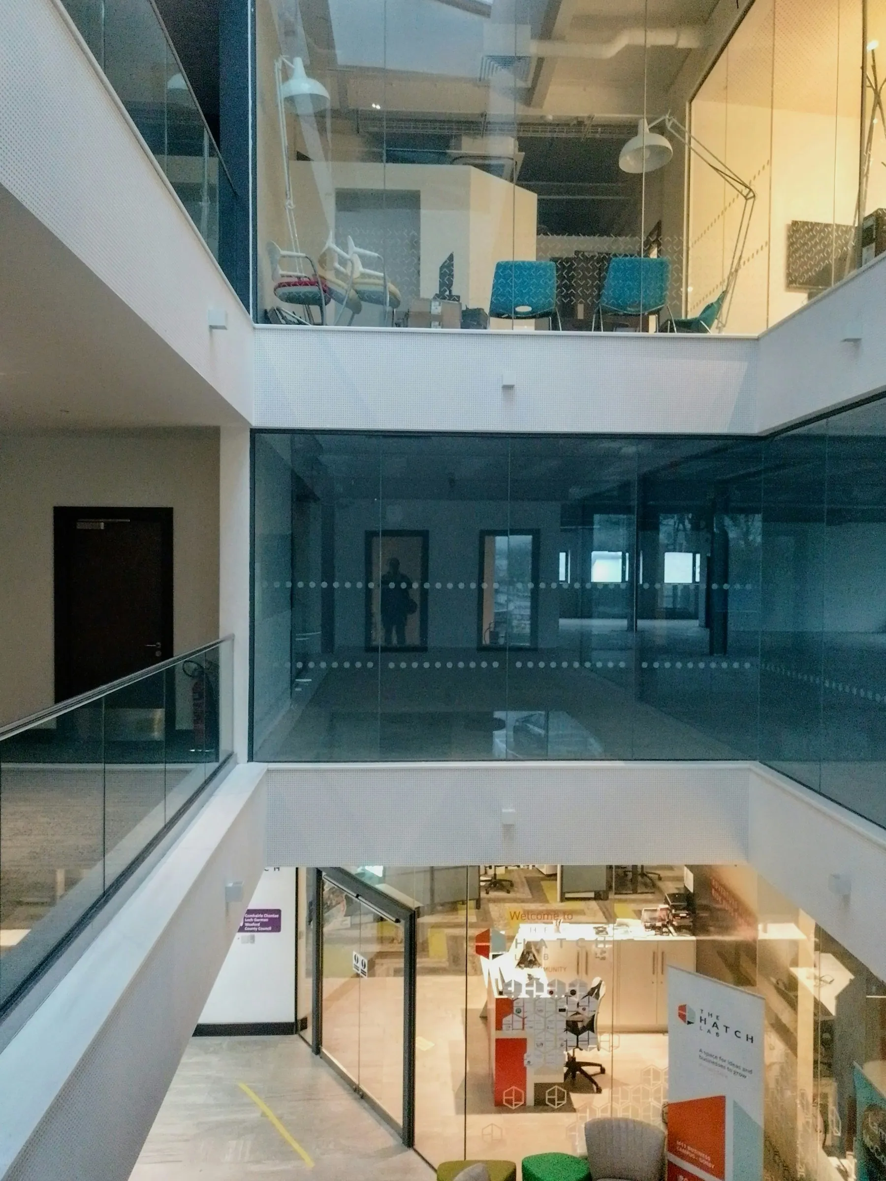 Open commercial interior with glass walkways